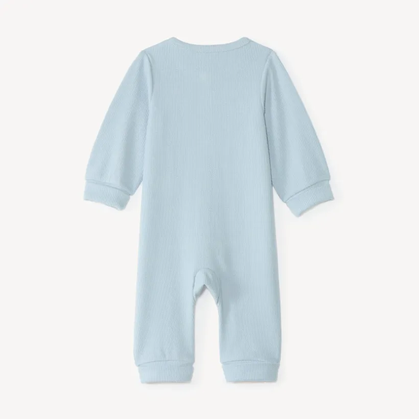 Langdurige jongensbabykleding in geribbelde stof met robotborduurwerk