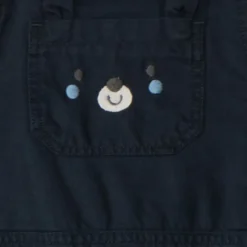 Lange salopette met een speelse zak voor babyjongen