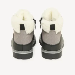 Leren jongens boots met veters en rits met schapenwollen inzet.