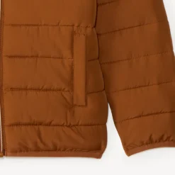 Lichte, waterafstotende winterjas met capuchon voor jongens.