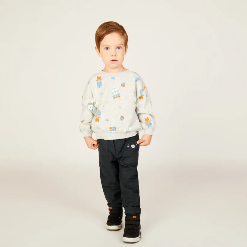 Ludieke broek met zakken voor babyjongen