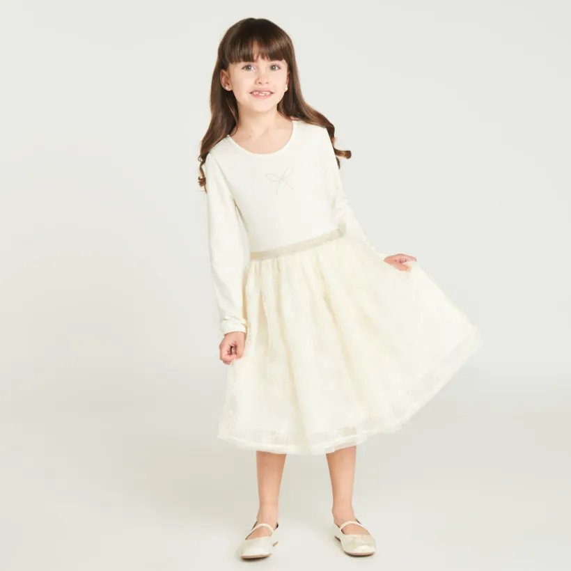 Meisjesjurk met lange mouwen en 2-in-1 tulle geborduurd effect.