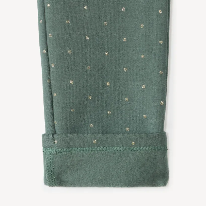 Meisjes skinny broek van fleecemateriaal met gouden stippen