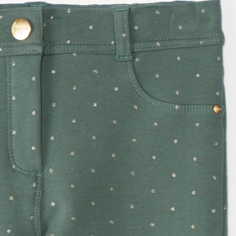Meisjes skinny broek van fleecemateriaal met gouden stippen