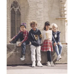 Muts in tricot met geborduurde Harry Potter-badge