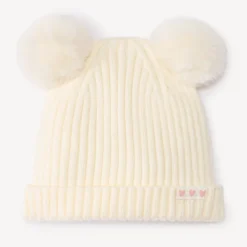 Muts van geribd gebreid met pompons voor babymeisje