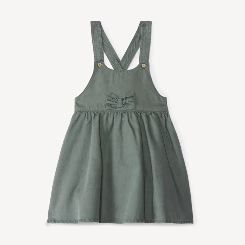 Overgooierjurk met gekruiste bretellen en knoop voor babymeisje