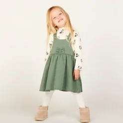 Overgooierjurk met gekruiste bretellen en knoop voor babymeisje