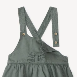 Overgooierjurk met gekruiste bretellen en knoop voor babymeisje