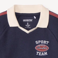 Poloshirt met lange mouwen en fantasiebadge jongens