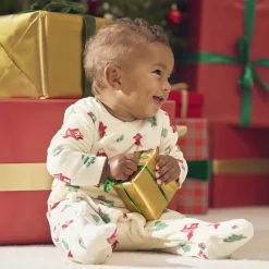 Pyjama in fluweel met kerstboomprint voor baby
