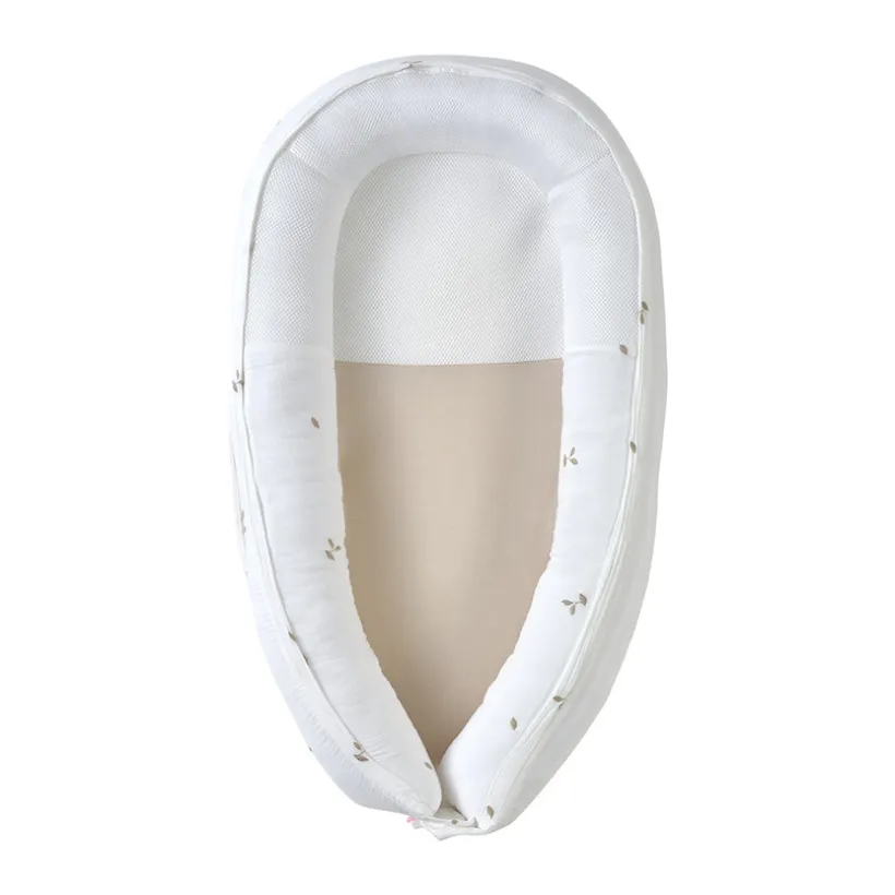 Réducteur de lit évolutif Kokkoony brodé blanc/beige