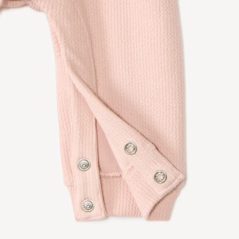 Set van 2 delen, jumpsuit en mouwloos vest met fantasiepatronen.