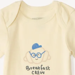 Set van 7 effen baby's rompers met fantasieprint