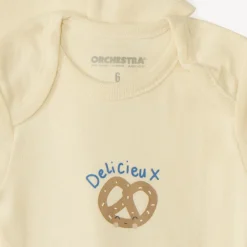 Set van 7 effen baby's rompers met fantasieprint