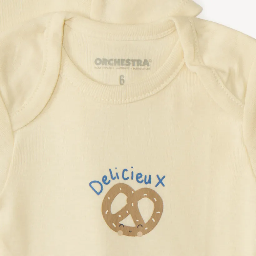 Set van 7 effen baby's rompers met fantasieprint