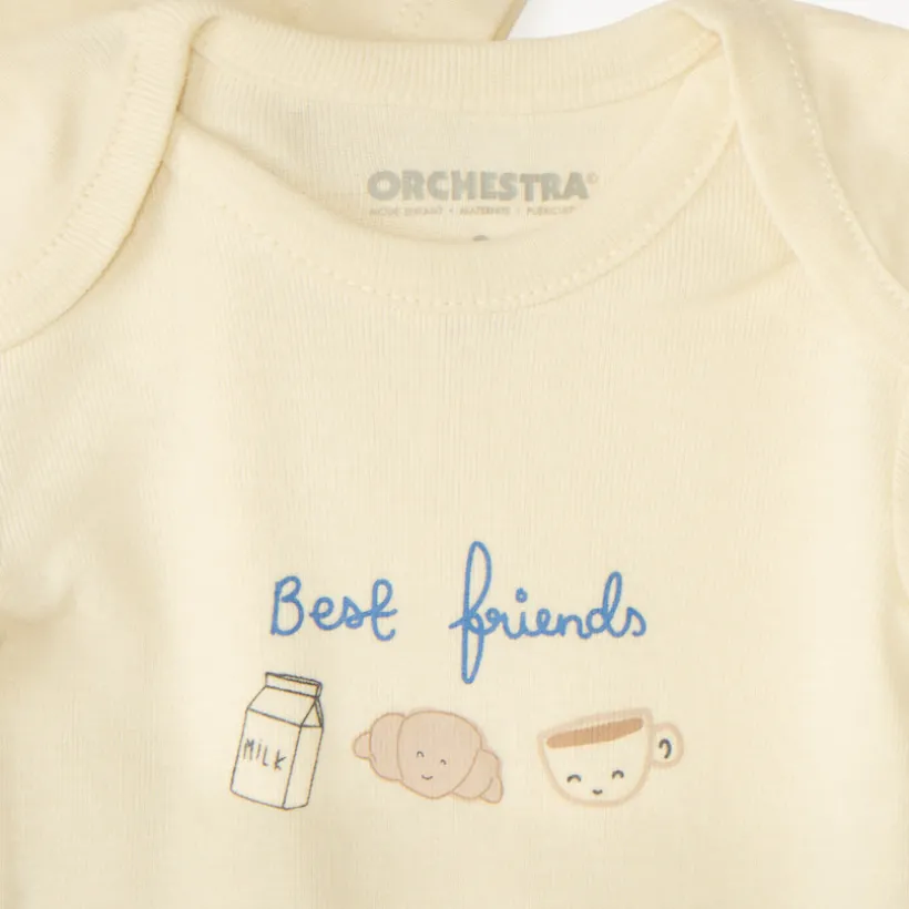 Set van 7 effen baby's rompers met fantasieprint
