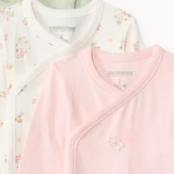 Set van 7 fantasie bodies met lange mouwen meisjes met verschillende sluitingen afhankelijk van de leeftijd