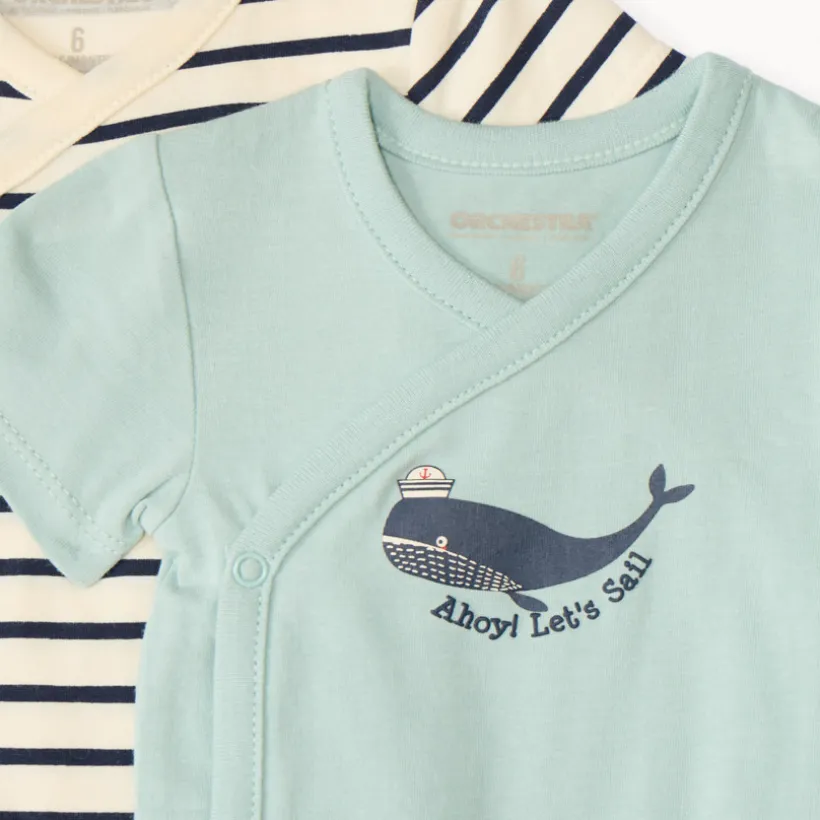 Set van 7 korte mouw rompertjes met maritieme prints voor babyjongens, met verschillende openingen afhankelijk van de leeftijd.