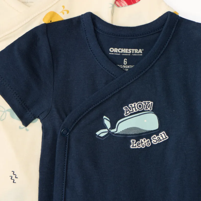 Set van 7 korte mouw rompertjes met maritieme prints voor babyjongens, met verschillende openingen afhankelijk van de leeftijd.