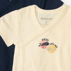 Set van 7 korte mouw rompertjes met maritieme prints voor babyjongens, met verschillende openingen afhankelijk van de leeftijd.
