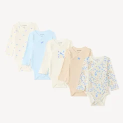 Set van 5 lange mouw bodies voor meisjes in pointelle met verschillende afwerkingen afhankelijk van de leeftijd.