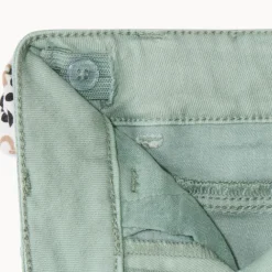 Slim jeans met knoopriem in luipaardprint meisjes