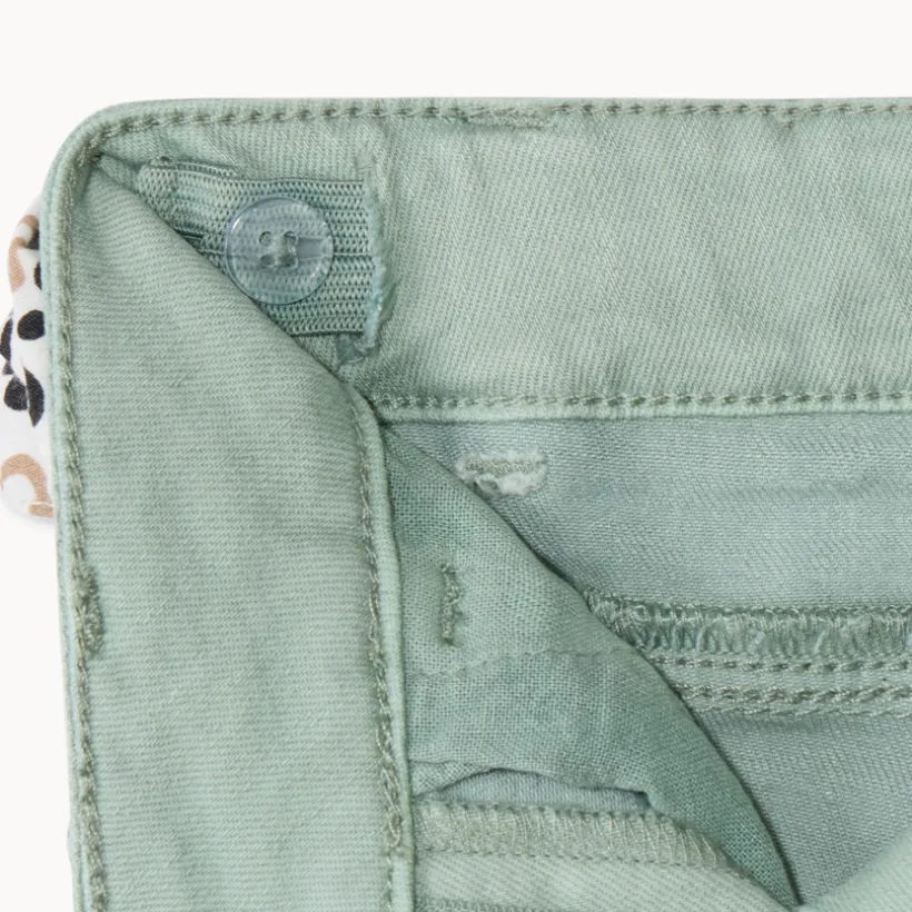 Slim jeans met knoopriem in luipaardprint meisjes