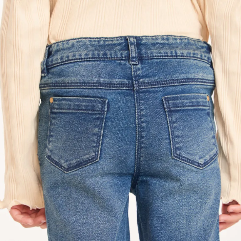 Slimme jeans in blauw denim met used effect meisjes