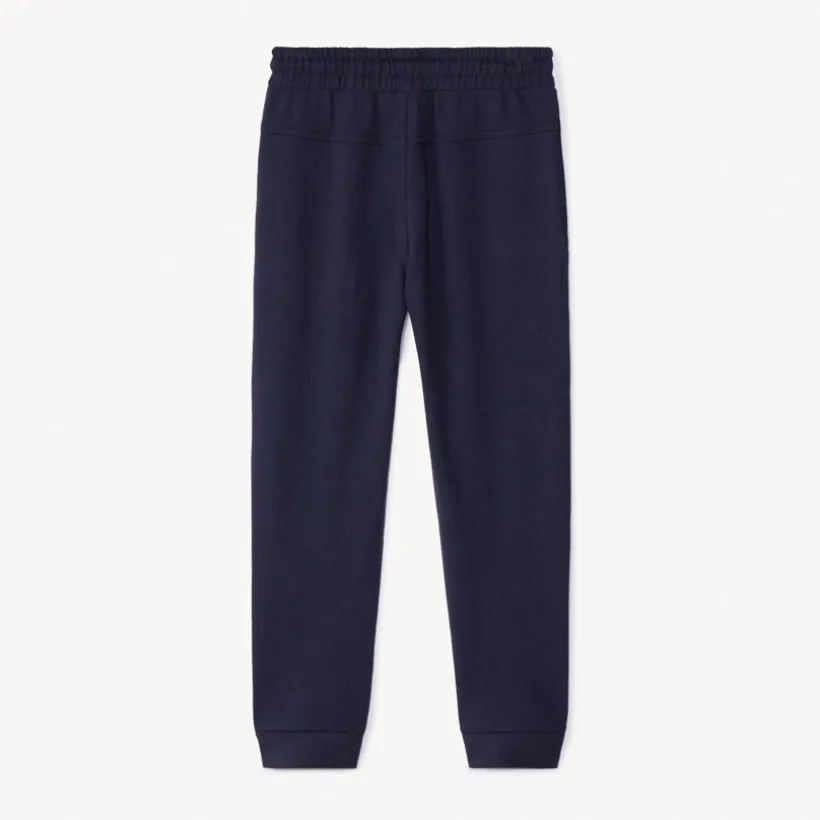 Sportbroek effen Super Man Warner jongens marineblauw met print
