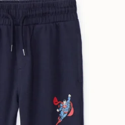 Sportbroek effen Super Man Warner jongens marineblauw met print