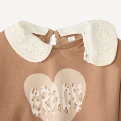 Sweatshirt voor meisjes met oversized pasvorm en afneembare Claudine kraag met fantasiedruk.