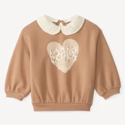 Sweatshirt voor meisjes met oversized pasvorm en afneembare Claudine kraag met fantasiedruk.