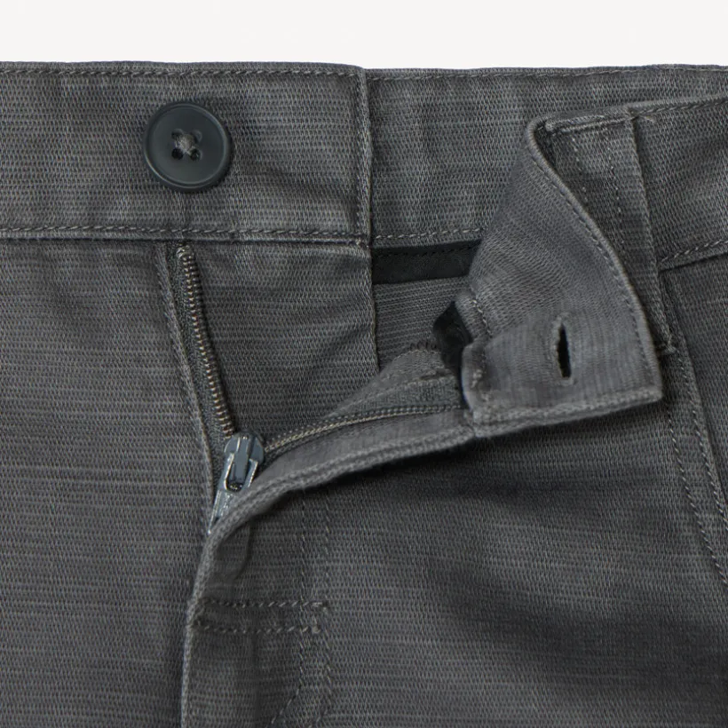 Textuur canvas bermuda met cargo-achtige zak jongens