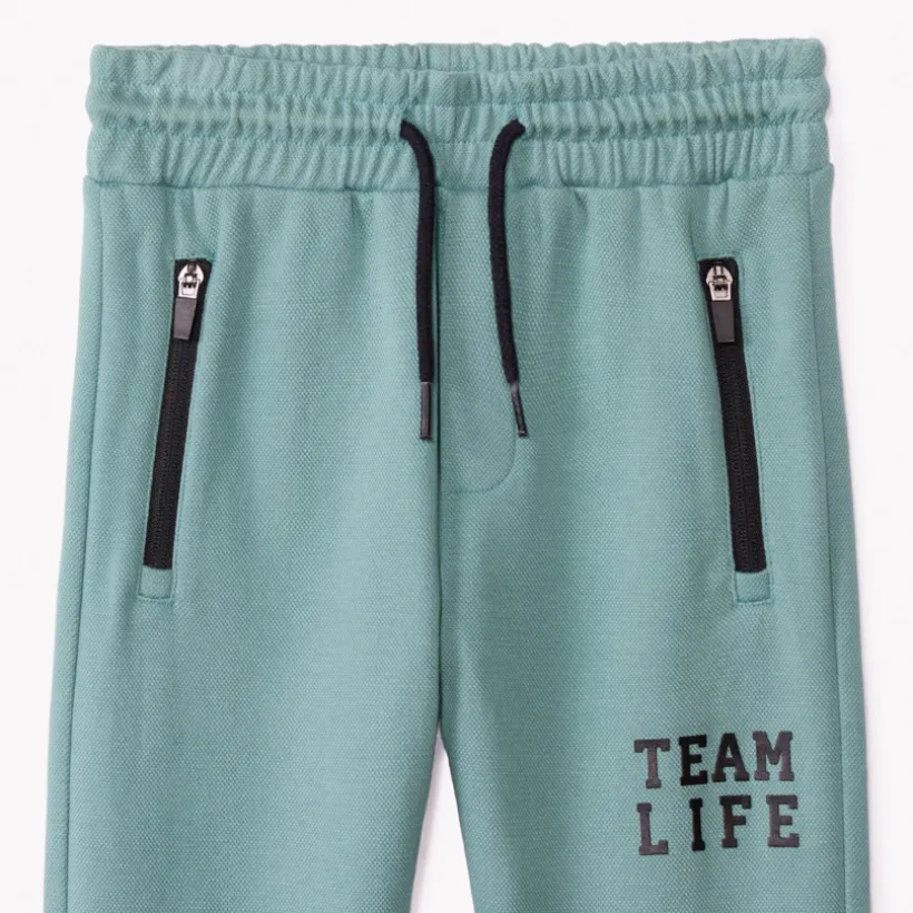 Tweedelig joggingensemble in piqué fleece jongens, effen turquoise kleur