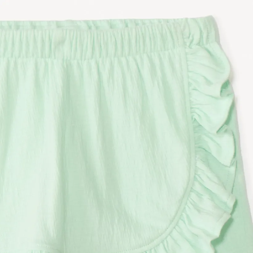 Tweedelig set met mouwloos shirt en bloemetjes shortrok meisjes