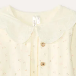 Tweedelig set voor baby meisjes: rompertje met vesteffect en legging.