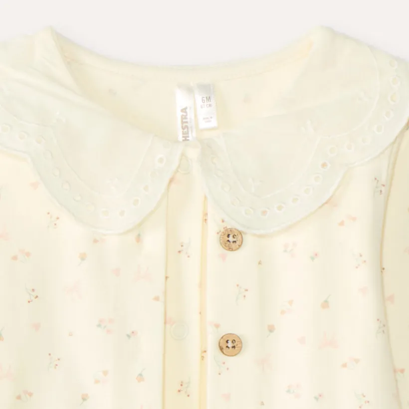 Tweedelig set voor baby meisjes: rompertje met vesteffect en legging.